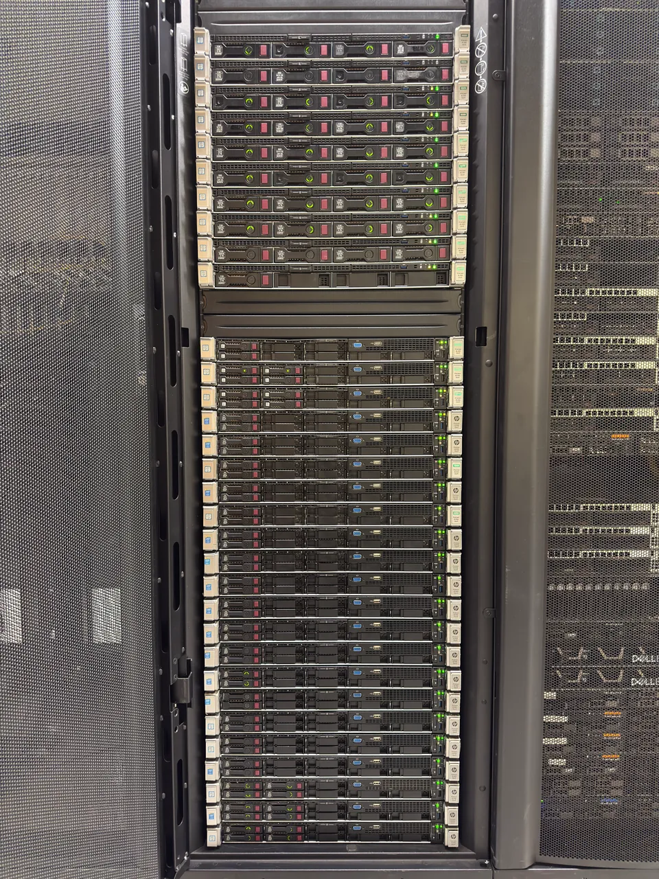 Open cabinet filled with rack-mounted servers